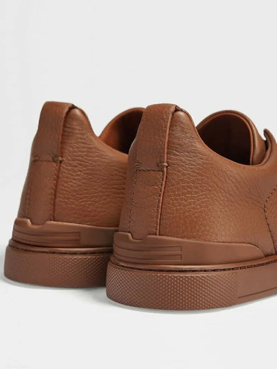 ZGN Triple Stitch Grained Leather Sneakers – Brown